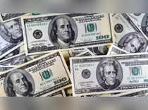 Dollar eases as traders weigh rate cut prospects