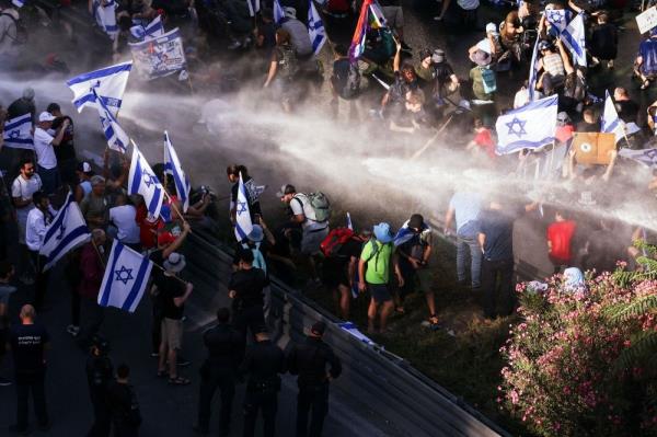 Israel passes contested curbs on some Supreme Court powers as protests rage